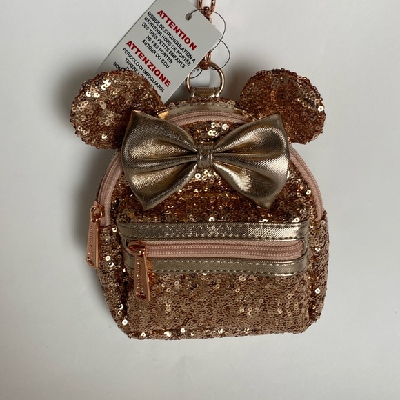 disney mini backpacks rose gold Parks Exclusive - LoungefIy Backpack W 9 x H 10 x D 4.5 Embrace the baby pink renaissance with the utterly irresistible Loungefly Disney Minnie Mouse Classic Series Mini Backpack Mini Backpack Loungefly Disney Fanny
